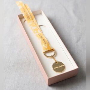 Miu Miu Beaute Yellow Daisy Floral Ribbon Keychain Charm New